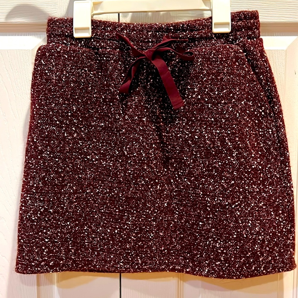 Tweed mini skirt w tie front detail in XS